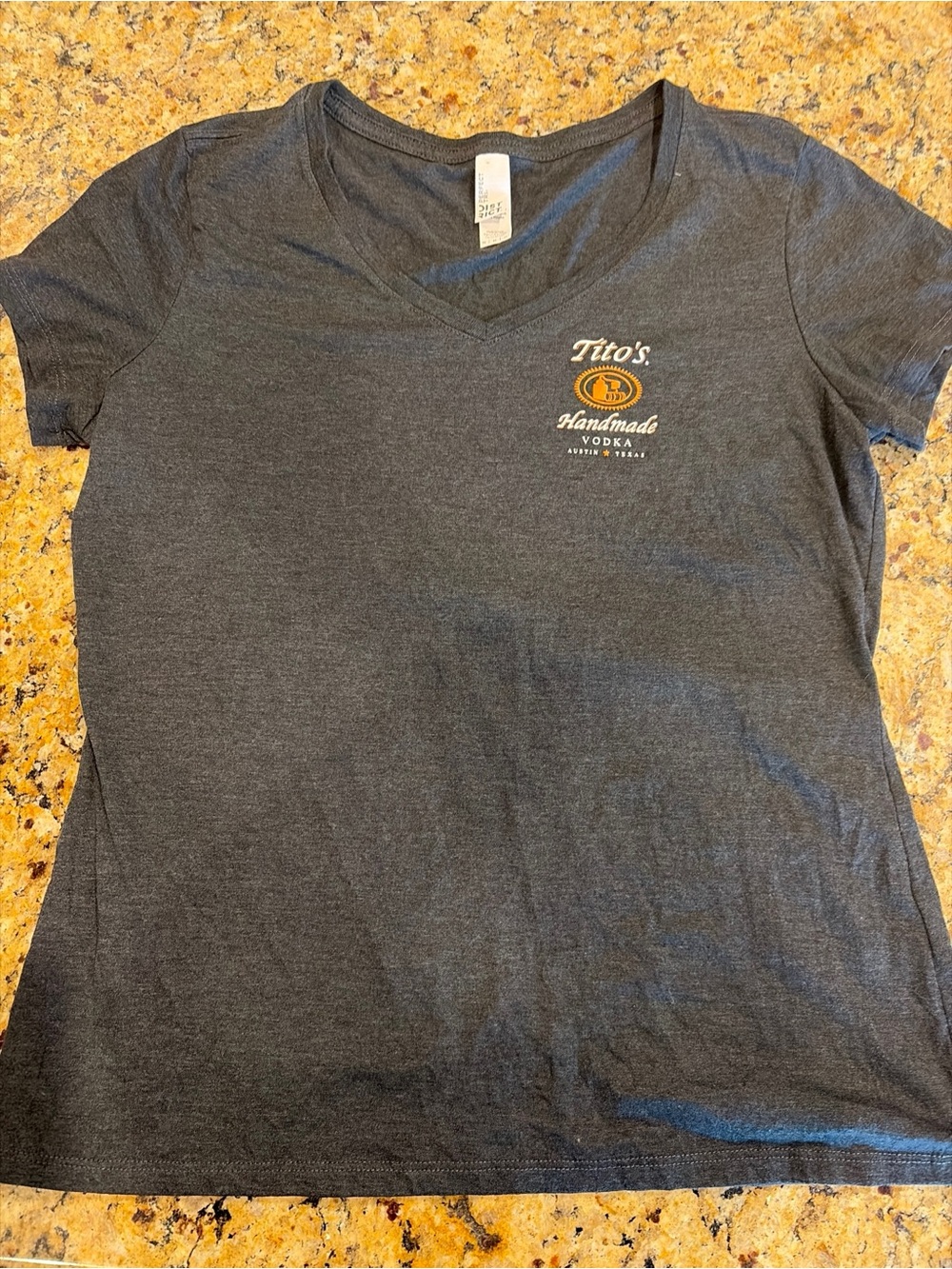 District Women's Dark Gray V-Neck Tee with Small Tito’s Vodka Logo size M